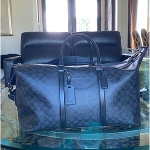 NWT COACH SIGNATURE TREKKER 52